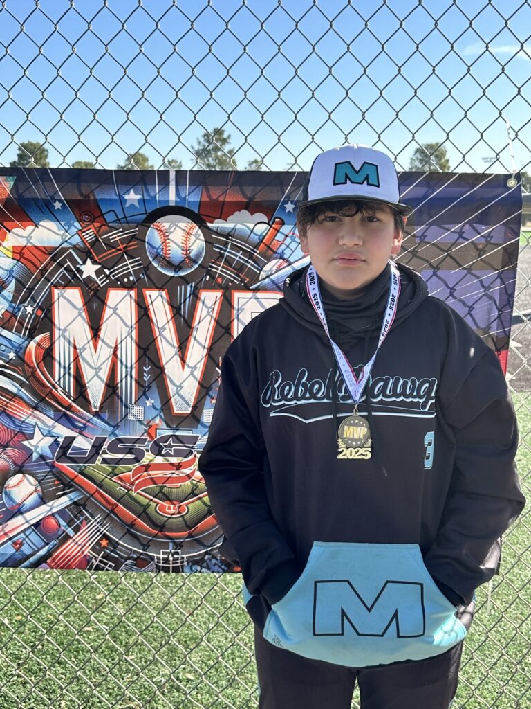 Alan Anchondo wearing MVP medal after baseball game